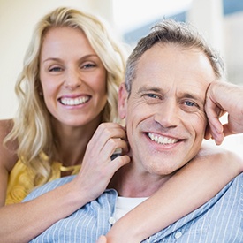 Older couple smiling happily