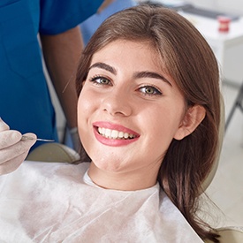 Woman smiling in dental chair