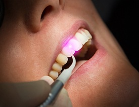 Patient receiving treatment with soft tissue laser